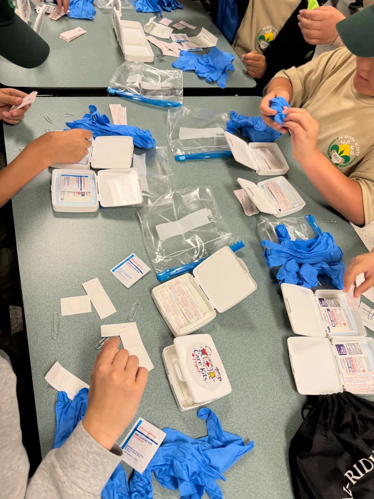 A full cafeteria of scouts gathered for a Care Kits workshop